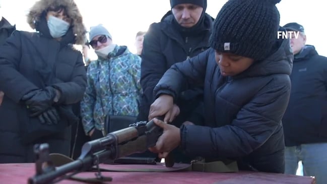 In Kyiv, children as young as 9 train with guns amid fears of Russian invasion 